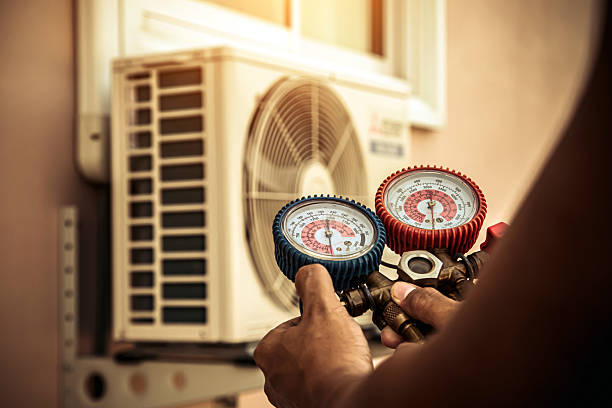 Professional Ac Installation technician working in Finley, WA